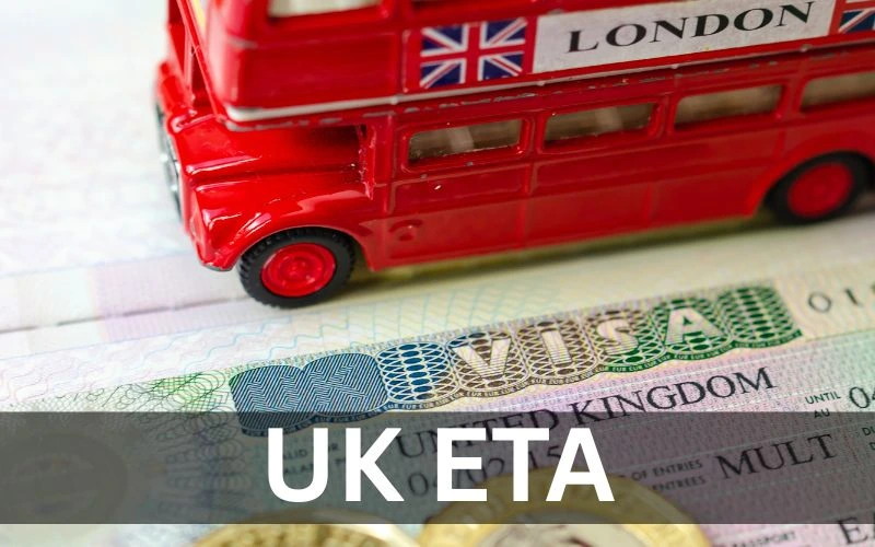 UK ETA is written on a London bus model, symbolizing travel and holidays in London.