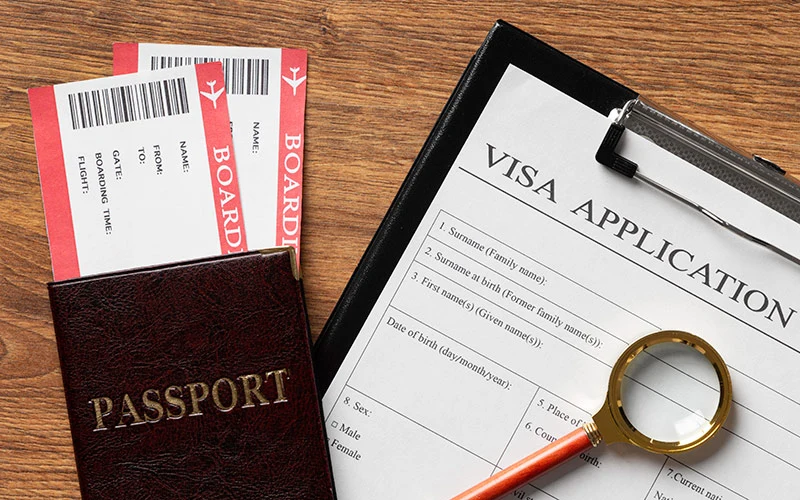 Top view of a visa application form on a desk